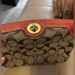 Coach Tan and Brown Signature Clutch with Red Trim